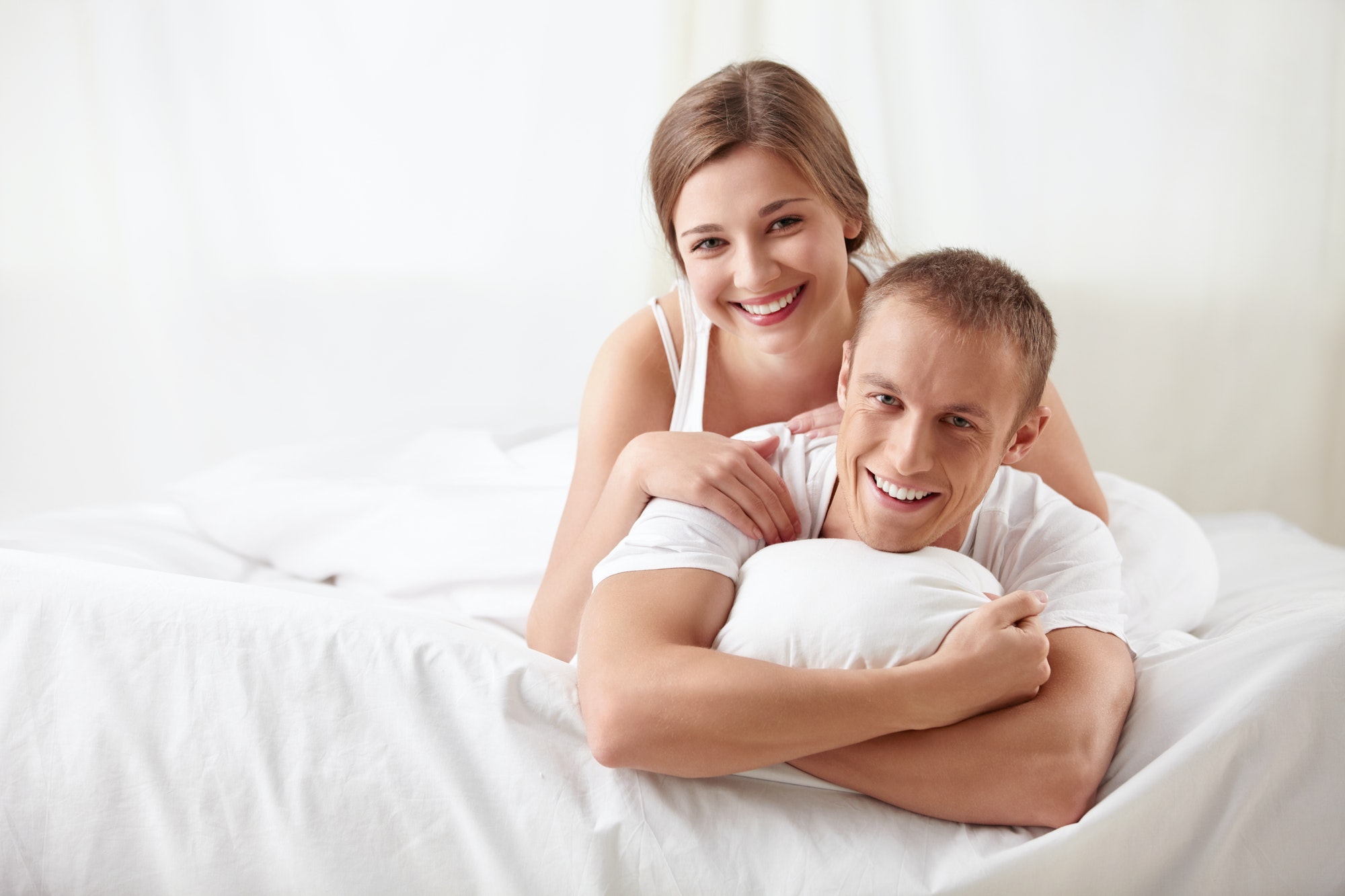 couple in bed happy again
