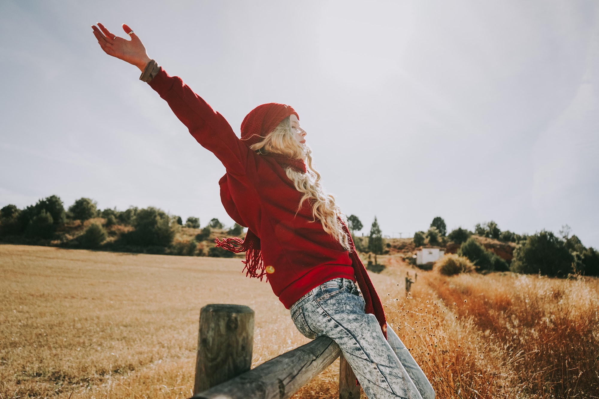 Happy young woman enjoying a sunny day
